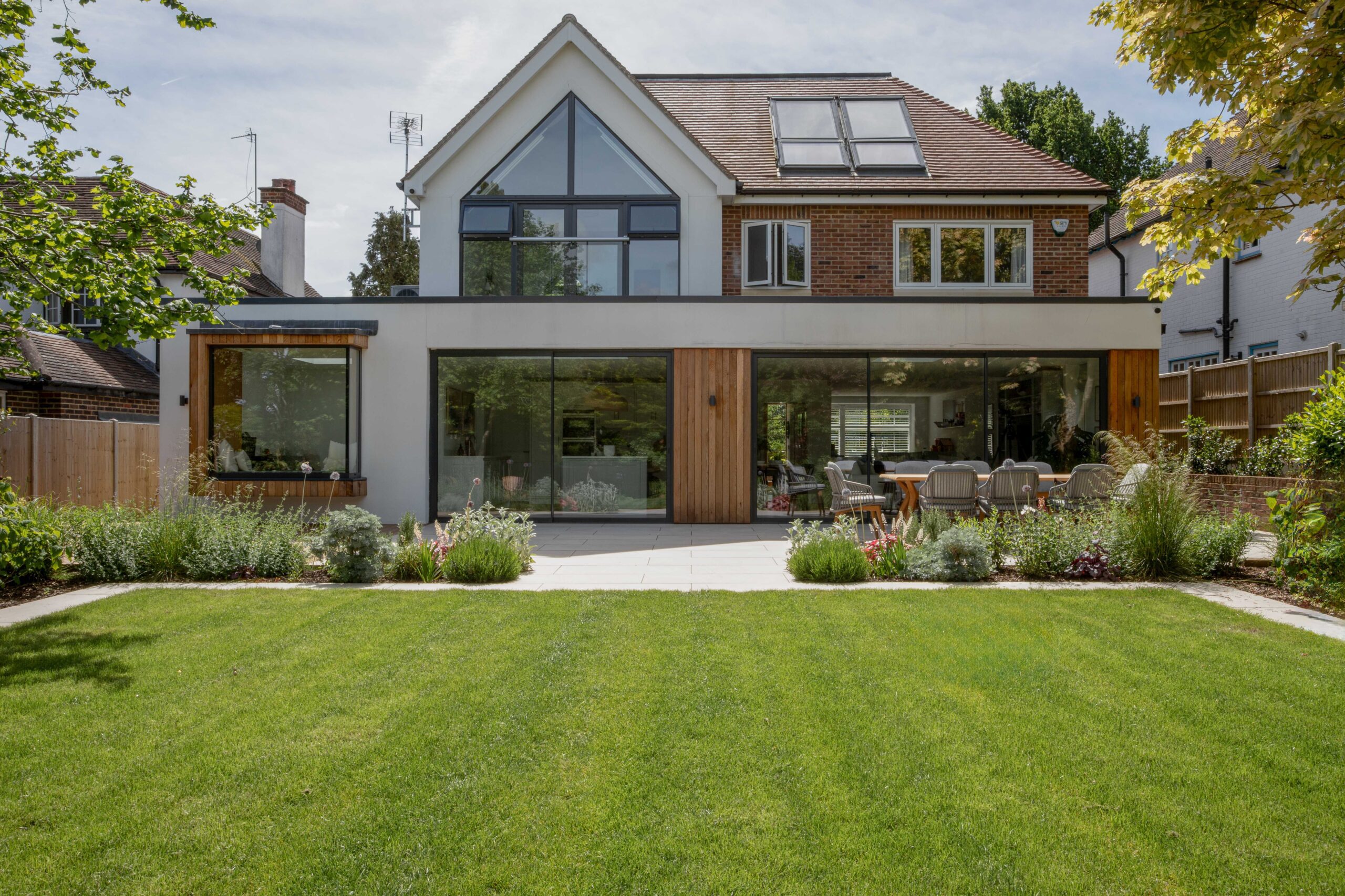 YES Vision ultra-slim sliding doors and frameless glass window link seat in Sevenoaks